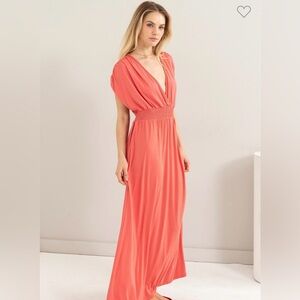 Gorgeous coral jersey maxi dress with open neckline. NWT